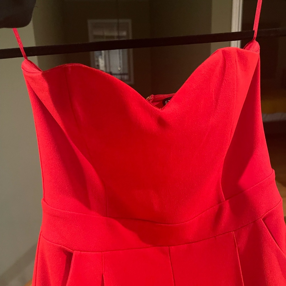 Red pant suit strapless